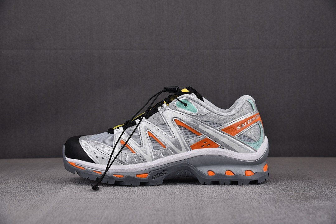Salomon XT-Quest Adv The Br0k*n Arms "Silver/Orange" L4064270032