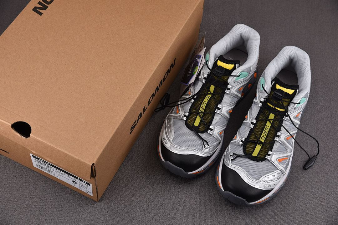 Salomon XT-Quest Adv The Br0k*n Arms "Silver/Orange" L4064270032