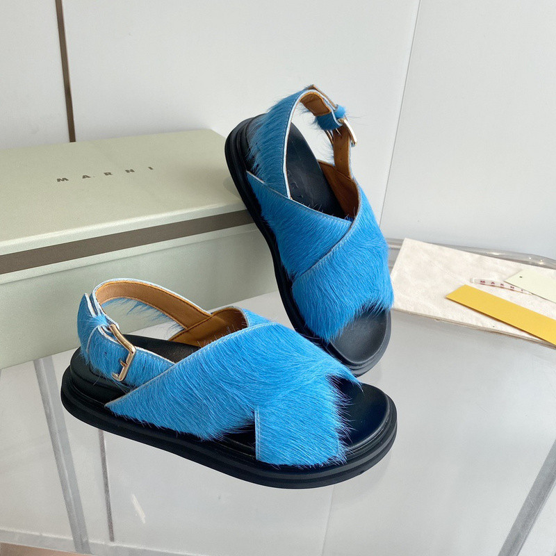 FUCHSIA LONG-HAIR CALFSKIN FUSSBETT